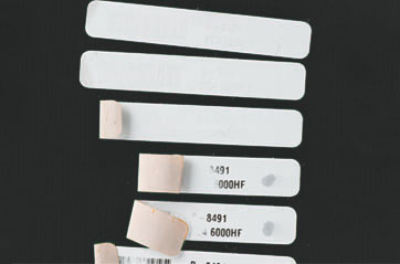 Label samples with varying levels of adhesion.